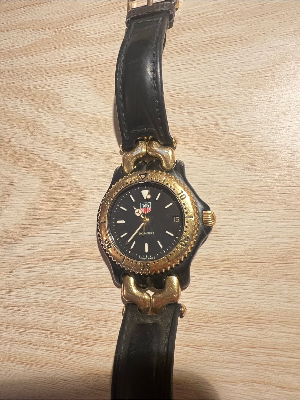 Vintage Tag Heuer Black Dial Watch With Gold Bezel